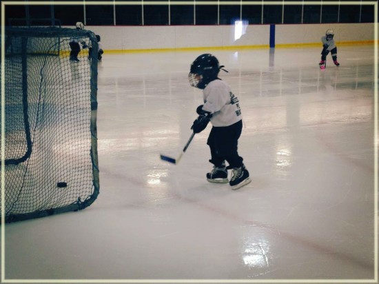 3 year old playing hockey