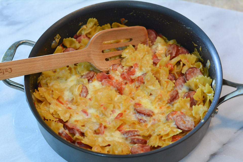 smoked sausage and pasta in large skillet