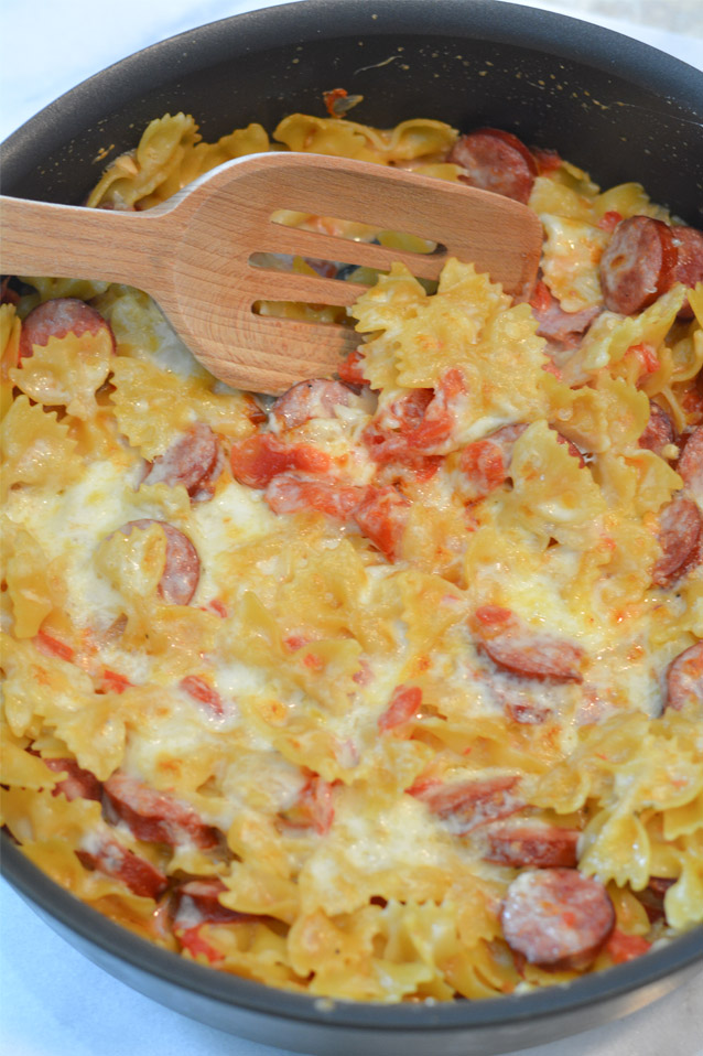 cheesy sausage pasta in skillet