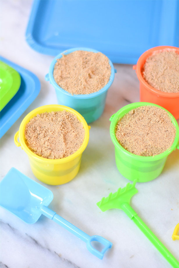 sand pudding in small sand pails