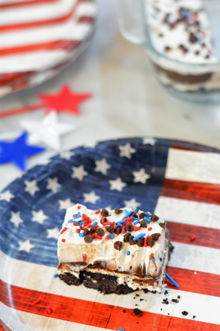 slice of oreo dessert on red white and blue plate