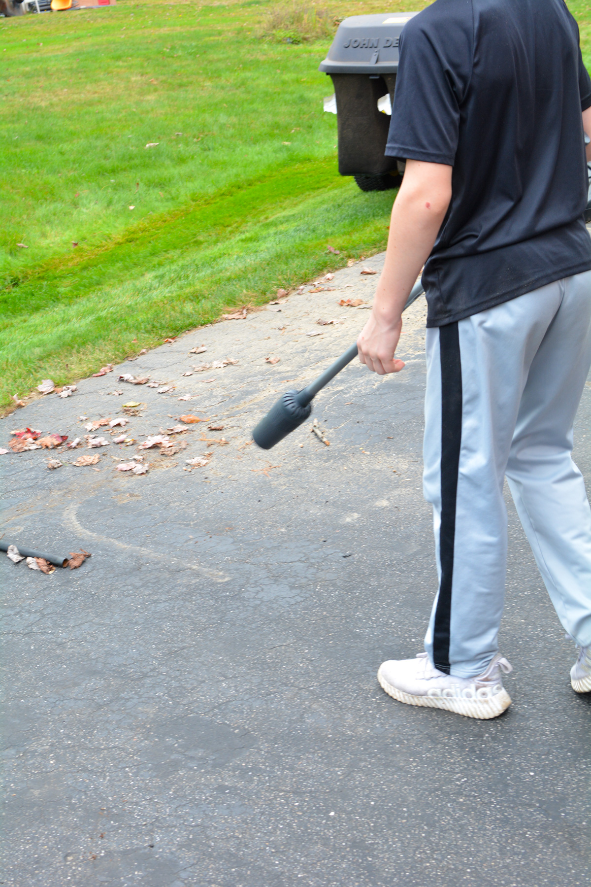 cleaning driveway with zoombroom